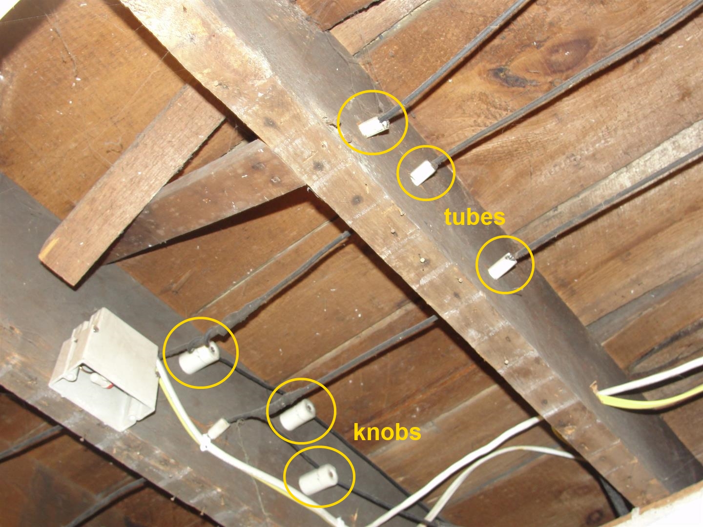 Knob and tube wiring visible in the attic of an older Toronto home